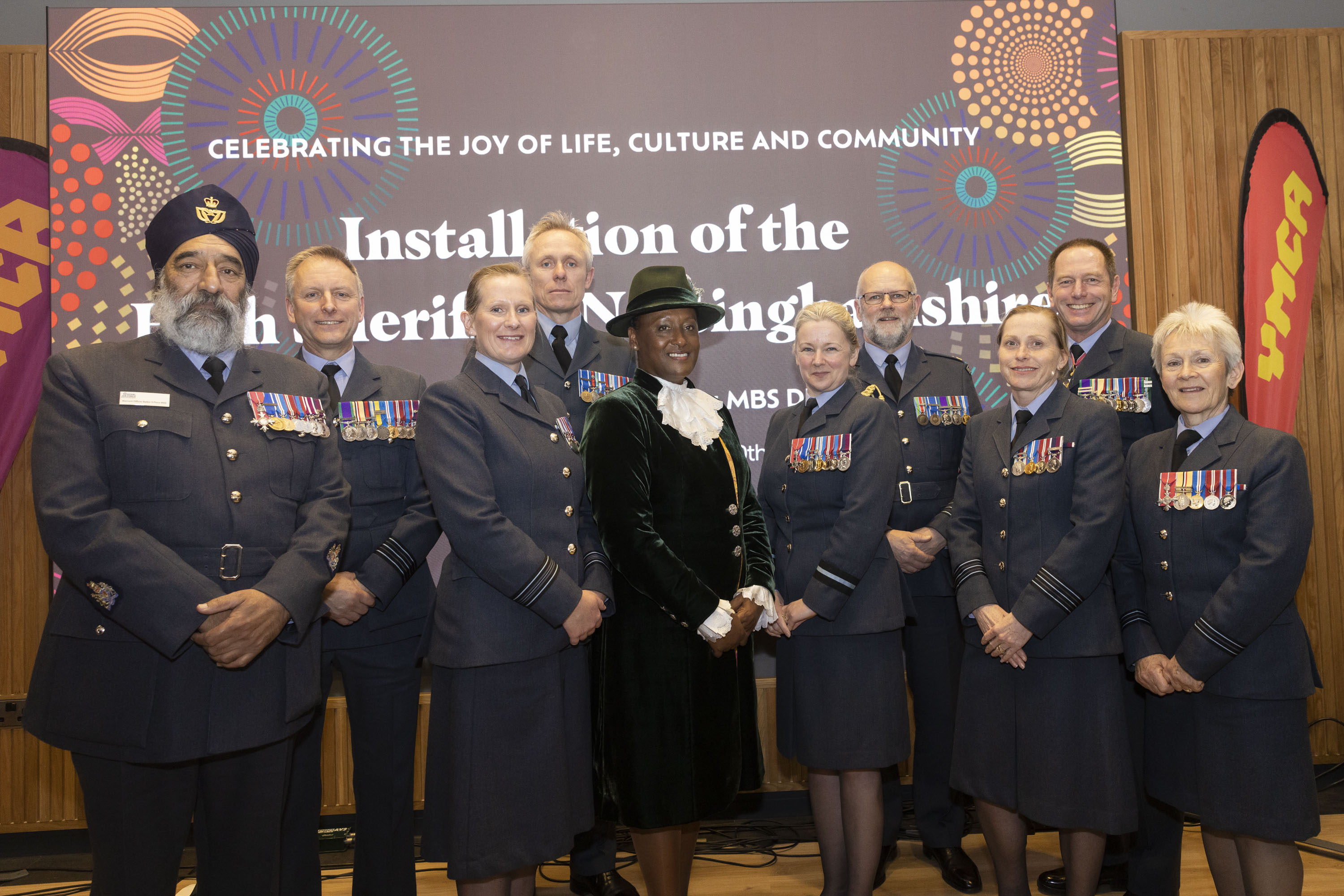 504 Sqn Honorary Air Commodore Veronica Moraa Pickering with representatives from the Royal Air Force